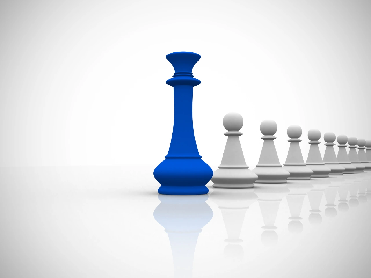 chess pieces arranged in a straight line with the king piece followed by pawns