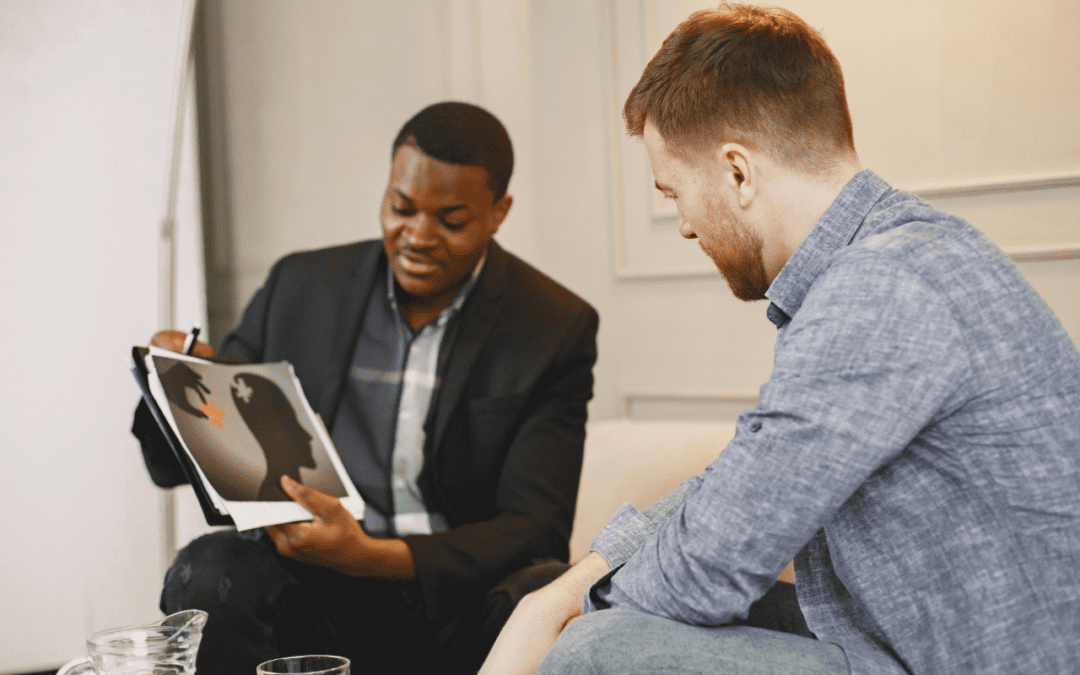 Career coach works with man in career transition